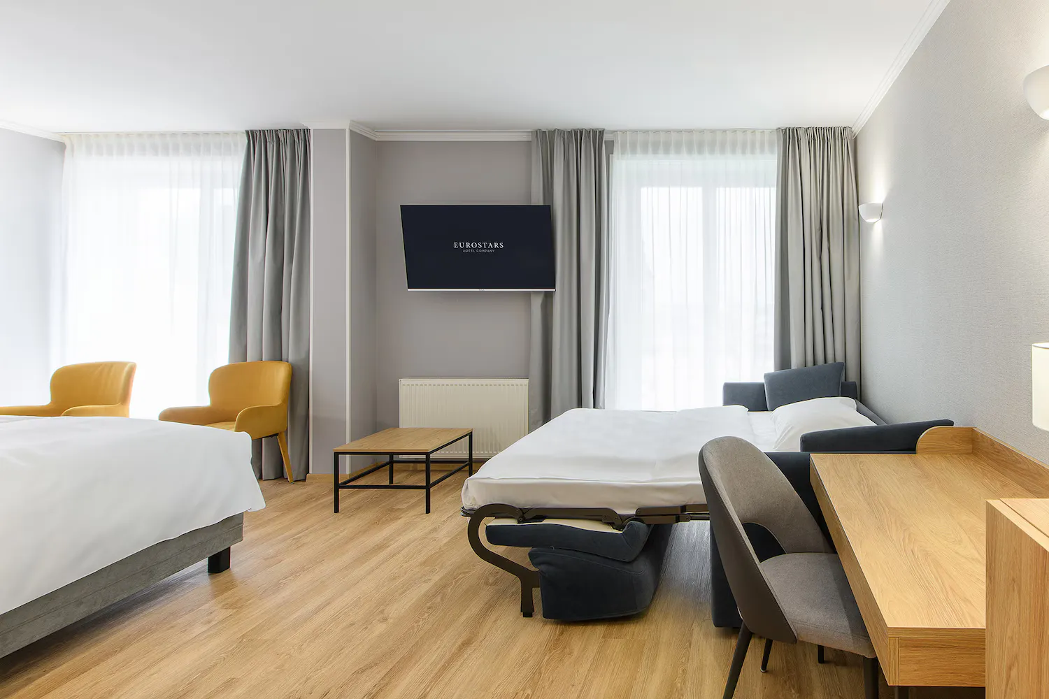 Family Room living area at Eurostars uHotel